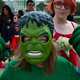 Kid in Hulk mask and gloves